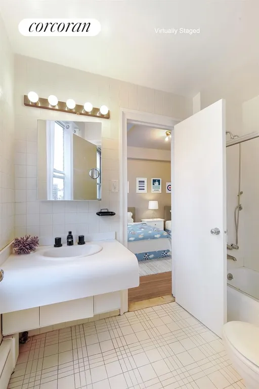 New York City Real Estate | View 333 West End Avenue, 8B | windowed full bathroom | View 12