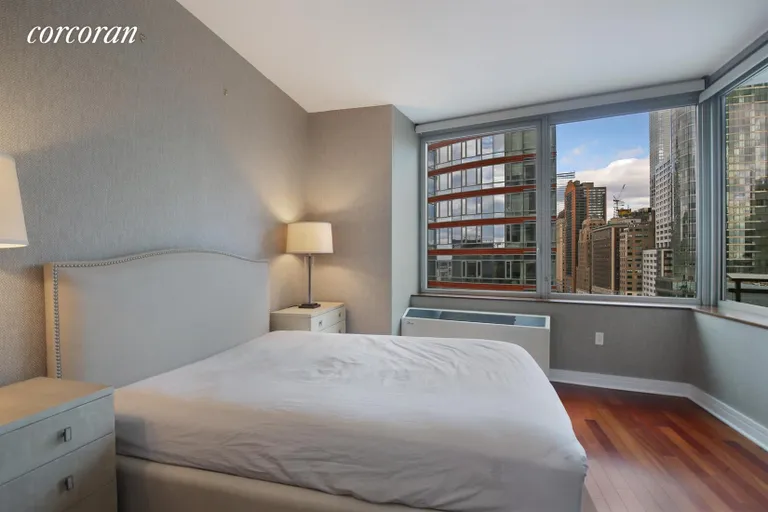 New York City Real Estate | View 30 West Street, 12B | Master Bedroom with Double Exposure | View 4