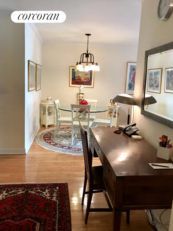 New York City Real Estate | View 220 East 65th Street, 10J | Hallway & desk area | View 5