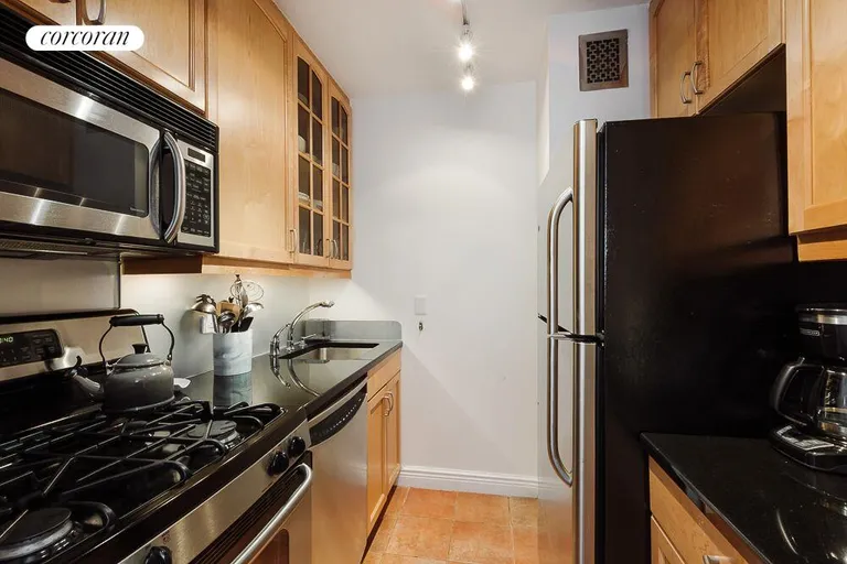New York City Real Estate | View 30 West 63rd Street, 14F | Modern Kitchen with Stainless Steel Appliances | View 2