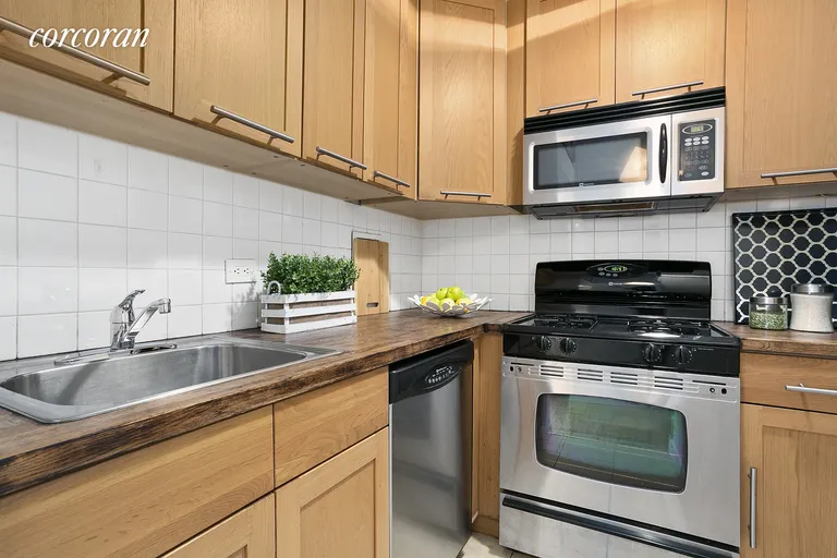 New York City Real Estate | View 96 Schermerhorn Street, 3H | Stainless steel appliances and rows of cabinets | View 4