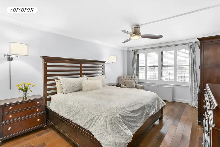 New York City Real Estate | View 225 East 57th Street, 8F | Spacious and Sunny Master Bedroom w/ En-Suite Bath | View 5