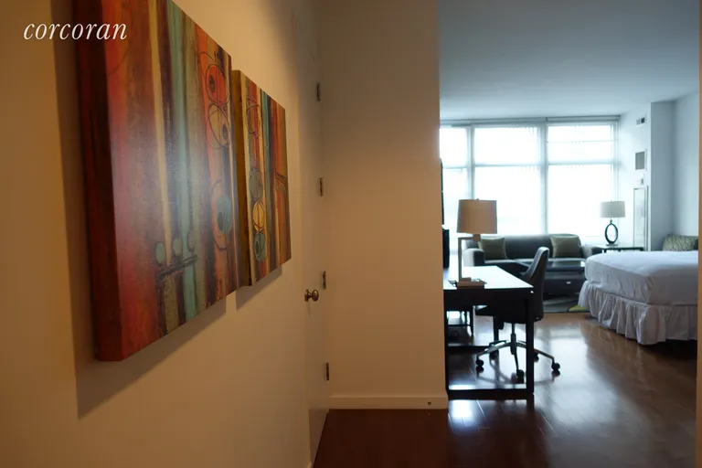 New York City Real Estate | View 1600 Broadway, 16F | Hall with art | View 4