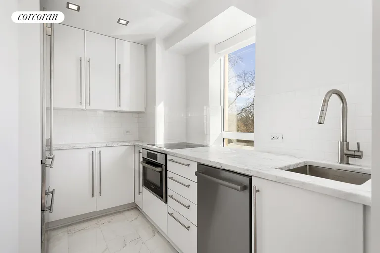 New York City Real Estate | View 25 Central Park West, 2P | Renovated Kitchen with Central Park Views | View 3