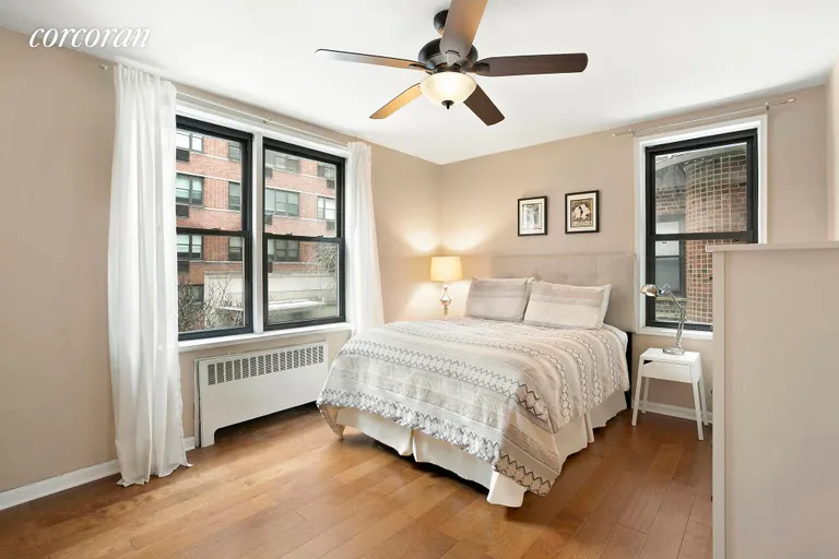 New York City Real Estate | View 60 East 9th Street, 232 | Corner Bedroom | View 4