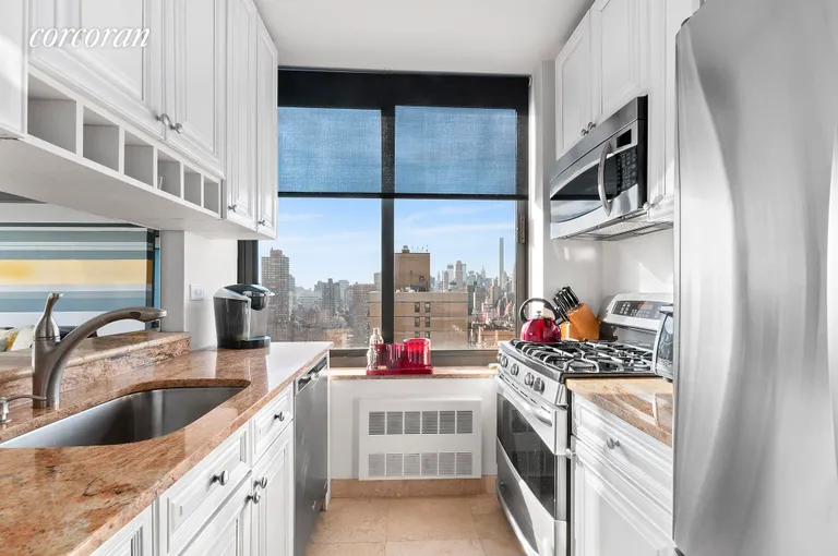 New York City Real Estate | View 300 East 85th Street, 3101 | Fully-equipped kitchen with tons of natural light | View 3
