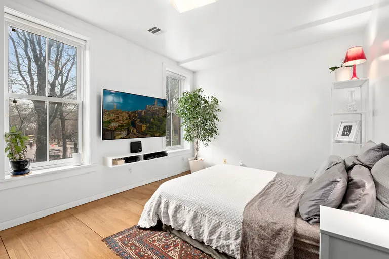 New York City Real Estate | View 246 Hall Street | Master Bedroom overlooking Pratt Sculpture garden | View 4