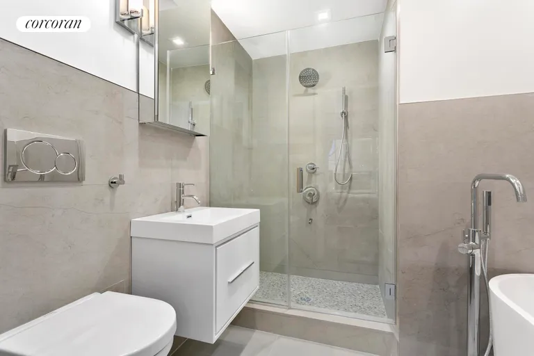 New York City Real Estate | View 373 Lincoln Road, 2 | Modern bathroom with soaking tub! | View 7