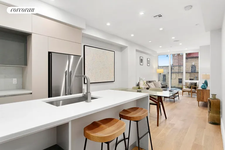 New York City Real Estate | View 373 Lincoln Road, 2 | Slick kitchen with waterfall countertop! | View 3
