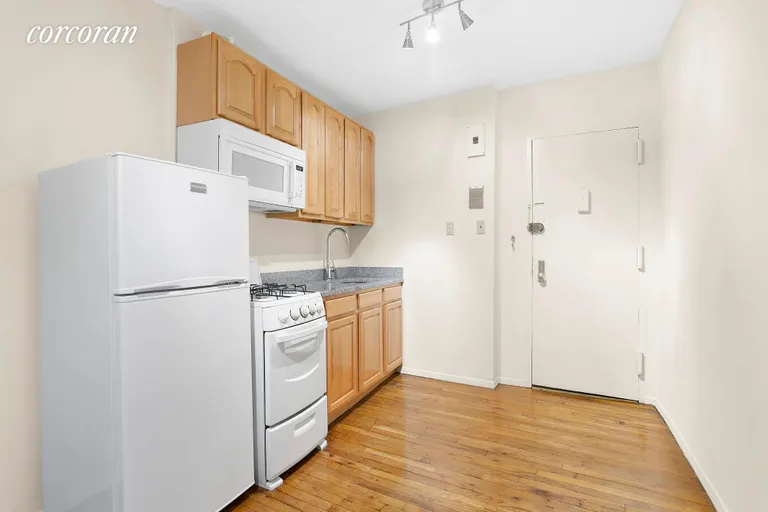 New York City Real Estate | View 242 East 10th Street, 1 | Living room facing kitchen | View 5
