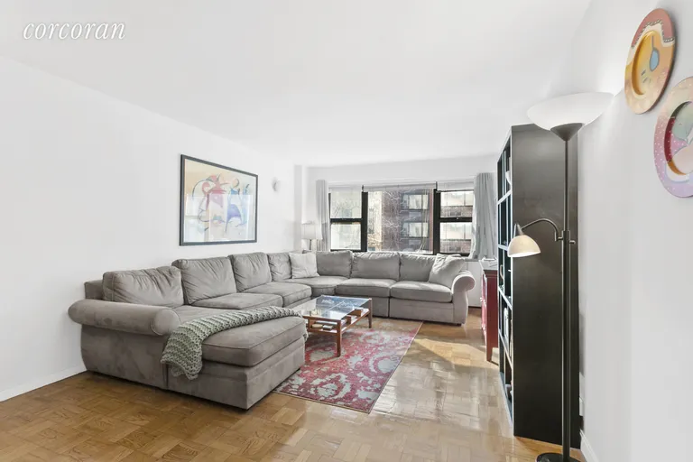 New York City Real Estate | View 335 East 51st Street, 2A | Sun drenched living room.  | View 2