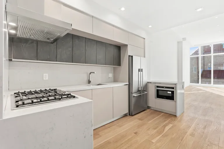New York City Real Estate | View 373 Lincoln Road, 4 | Kitchen and breakfast bar | View 4