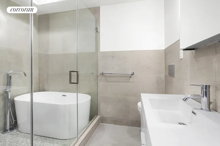 New York City Real Estate | View 373 Lincoln Road, 4 | Oversized shower with Kubebath Tub | View 8