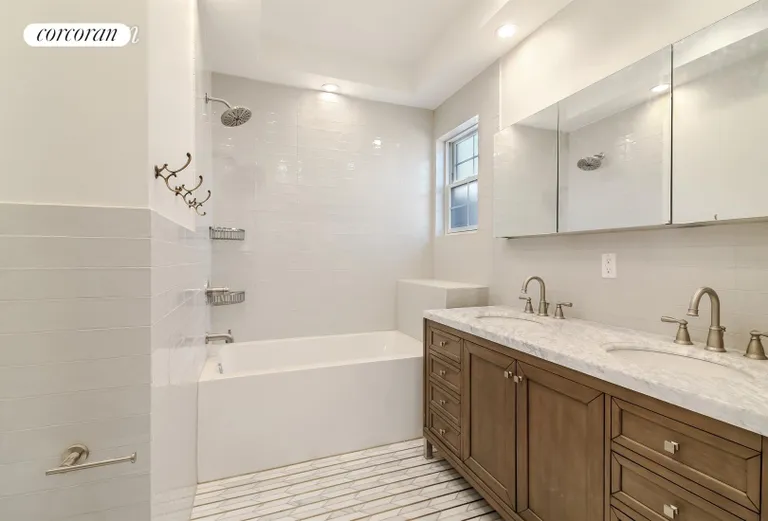 New York City Real Estate | View 228 Lexington Avenue | Master bathroom w/ deep soaking tub & custom tile | View 7