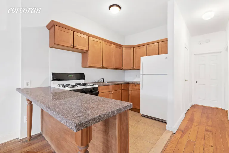 New York City Real Estate | View 434 56th Street, 2 | Open Kitchen With Breakfast Bar | View 2