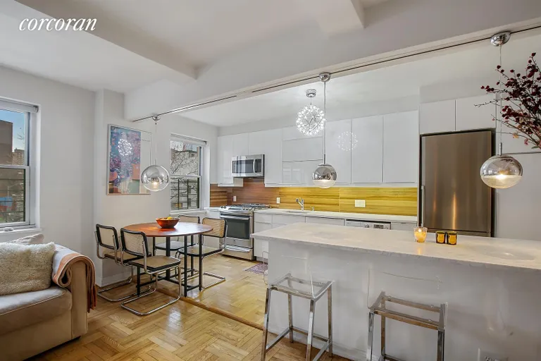 New York City Real Estate | View 530D Grand Street, 3A | Windowed Dining Area and Kitchen Center Island | View 3