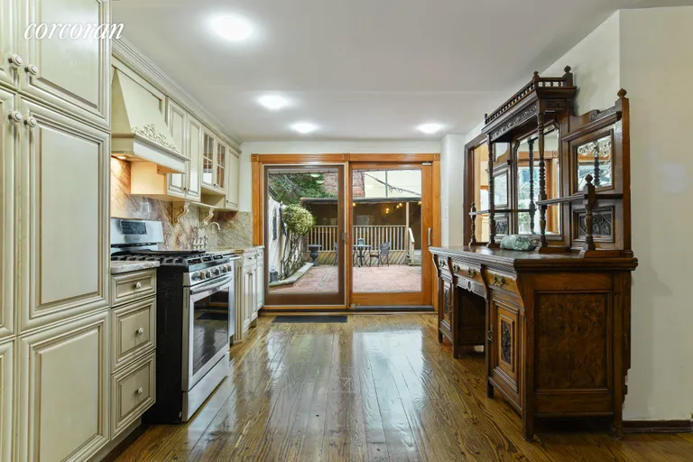 New York City Real Estate | View 240 11th Street | Lovely eat in kitchen opens up to backyard beyond | View 5