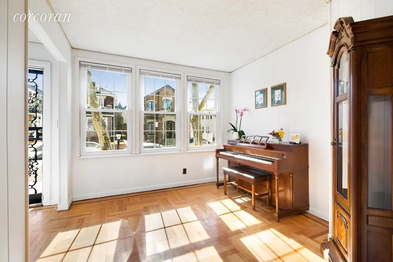 New York City Real Estate | View 85 78th Street | WINDOW-FILLED SUNPORCH ENTRY | View 2