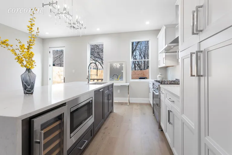 New York City Real Estate | View 139 Rochester Avenue | Kitchen with Bosch appliances and wine cooler! | View 5