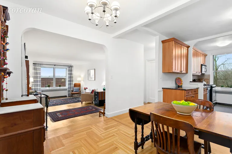 New York City Real Estate | View 360 Cabrini Boulevard, 6F | Living Room/Dining Room/Kitchen | View 2
