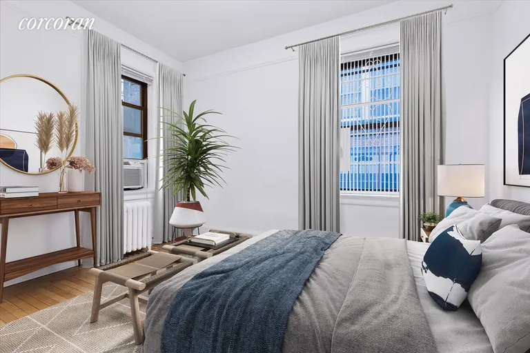New York City Real Estate | View 135 West 16th Street, 21 | Corner bedroom (virtually staged) | View 3