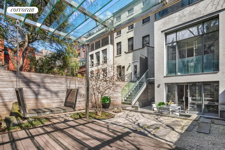 New York City Real Estate | View 16 Sidney Place | Rear facade with multiple points of outdoor access | View 19