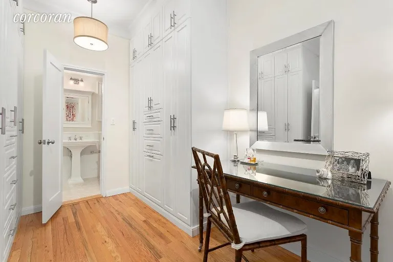 New York City Real Estate | View 20 East 88th Street, 3A | Dressing Area and Bathroom with Custom Built-ins | View 4