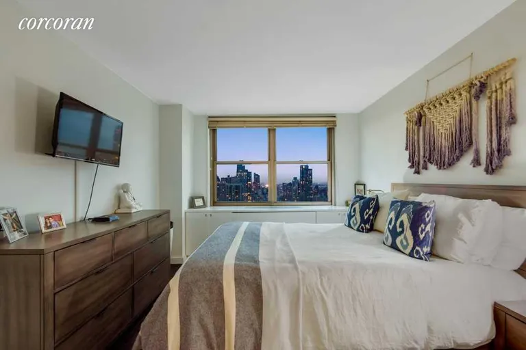 New York City Real Estate | View 301 East 79th Street, 36G | Spacious Bedroom at Twilight | View 6