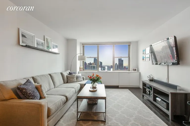 New York City Real Estate | View 301 East 79th Street, 36G | Living Room with Spectacular Views | View 3