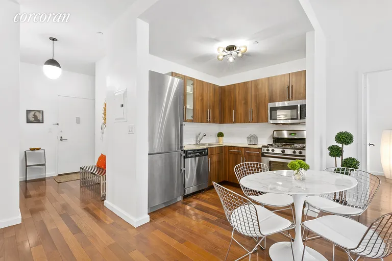 New York City Real Estate | View 1 Wall Street Court, 1109 | Open Kitchen with Stainless Appliances | View 3