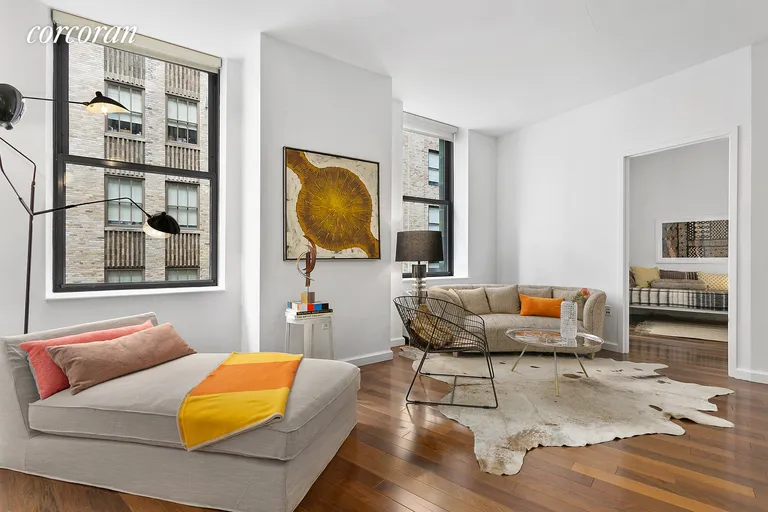 New York City Real Estate | View 1 Wall Street Court, 1109 | Over-sized Windows in Living Room | View 2