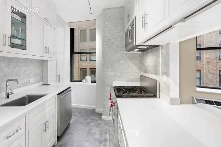 New York City Real Estate | View 1 Wall Street Court, 1105 | Top of the line Wolf appliances & custom cabinetry | View 3