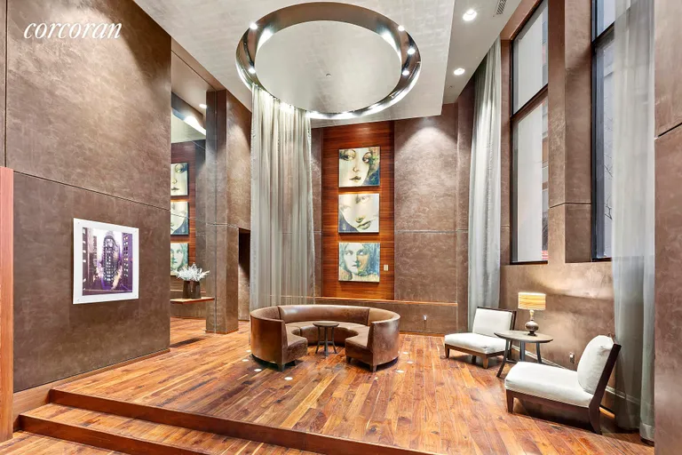 New York City Real Estate | View 1 Wall Street Court, 1105 | Rosewood lobby with 24/7 doorman  | View 7