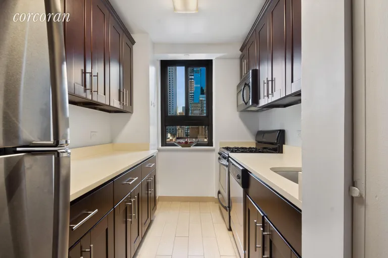 New York City Real Estate | View 347 West 57th Street, 19C | Windowed Kitchen | View 2