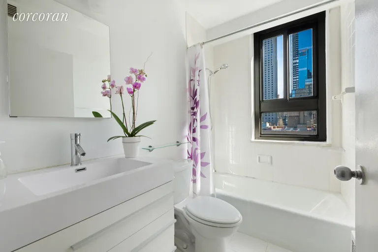 New York City Real Estate | View 347 West 57th Street, 19C | Windowed  bathroom | View 5