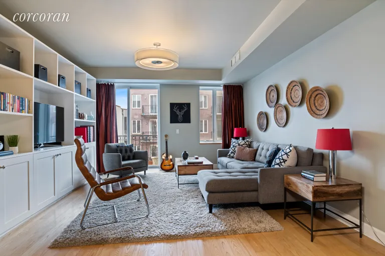 New York City Real Estate | View 316 2nd Street, 4E | Spacious Living Room w/ Custom Built-In Bookcases | View 2