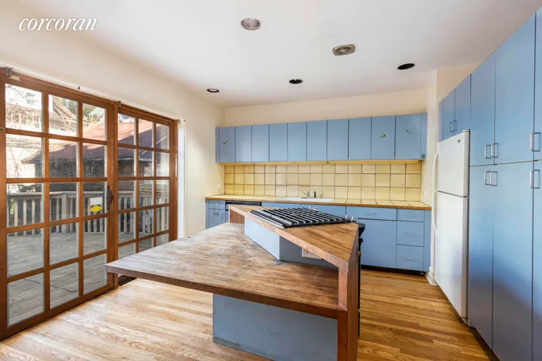 New York City Real Estate | View 334 Argyle Road | Kitchen opens onto large deck | View 2