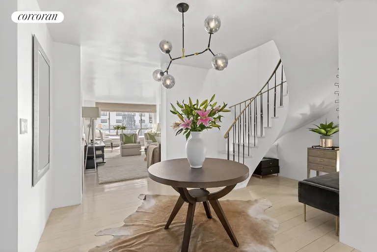 New York City Real Estate | View 1020 Park Avenue, 10-11D | Foyer with Staircase | View 3