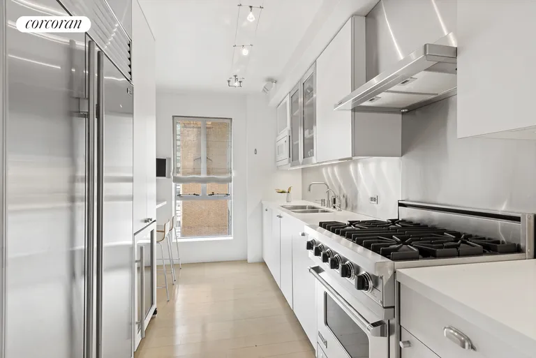 New York City Real Estate | View 1020 Park Avenue, 10-11D | Windowed Kitchen with Modern Appliances | View 4