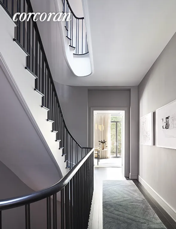 New York City Real Estate | View 135 West 11th Street | Oval staircase with sky-light above  | View 5