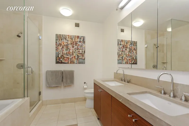 New York City Real Estate | View 30 West Street, 18B | Marble Master Bathroom | View 7