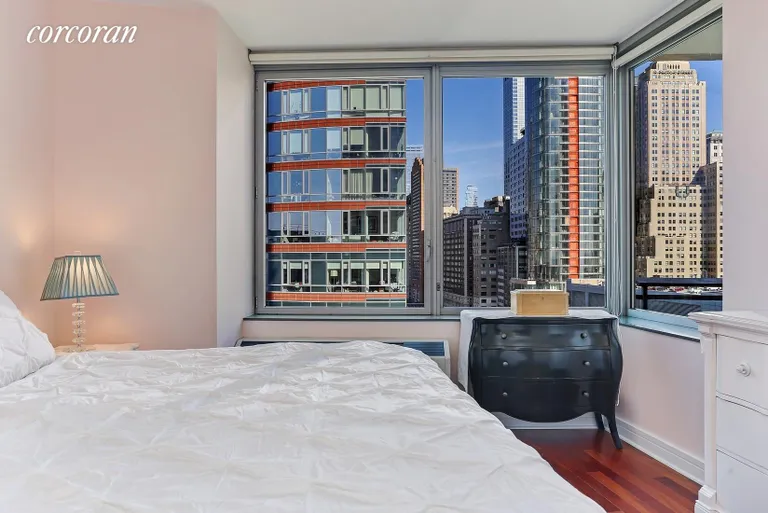 New York City Real Estate | View 30 West Street, 18B | Master Bedroom with Double Exposure | View 6