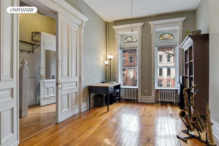 New York City Real Estate | View 562 Mac Donough Street | Living Room | View 4