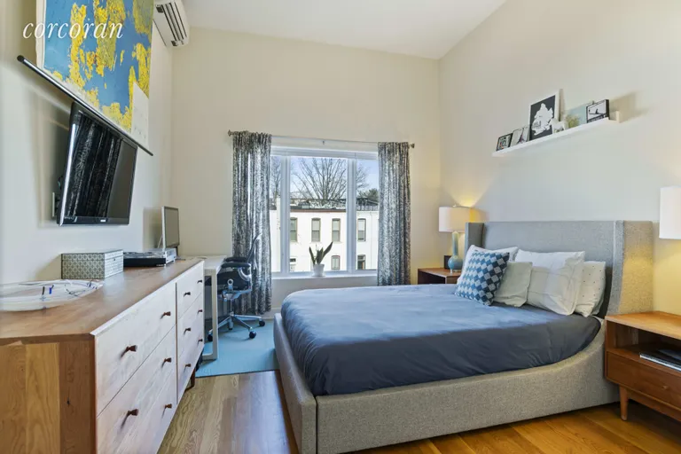 New York City Real Estate | View 379 Prospect Avenue, 3A | Airy Master Bedroom with Wall of Oversized Windows | View 3