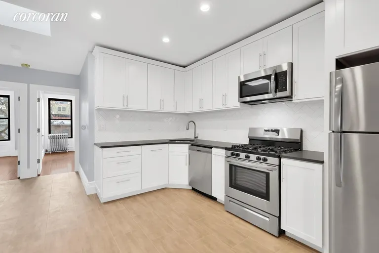 New York City Real Estate | View 590 10th Street, 3 | Creamy White Cabinetry w/ Herringbone Backsplash | View 3
