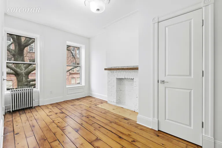 New York City Real Estate | View 1306 8th Avenue, 2 | Charming decorative fireplace, bonus room too | View 2