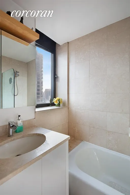 New York City Real Estate | View 250 East 40th Street, 45C | Master Bathroom | View 6