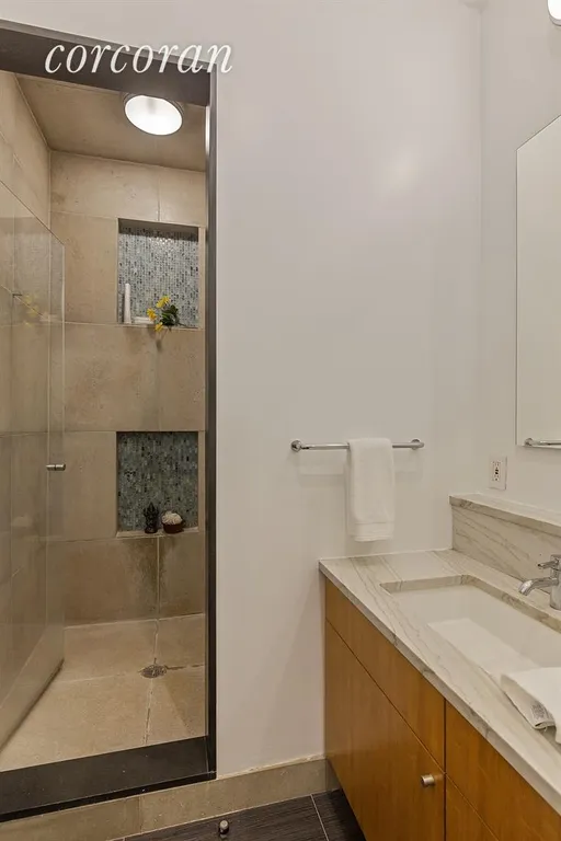 New York City Real Estate | View 233 West 26th Street, 5E | Master Bathroom | View 17