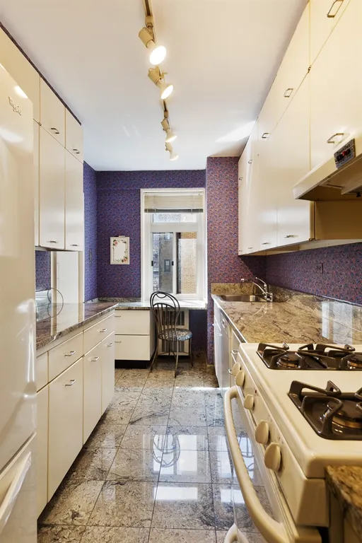New York City Real Estate | View 30 East 65th Street, 9C | Kitchen | View 6