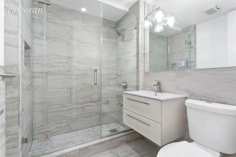 New York City Real Estate | View 1750 Dean Street, 50B | Tiled Bathroom | View 10